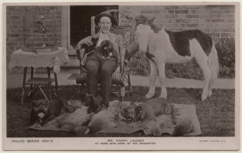 'Mr. Harry Lauder at home with some of his favourites' NPG x197795