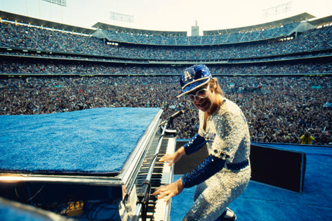 Photograph of Elton John performing, taken by Terry O'Neill, 1975.