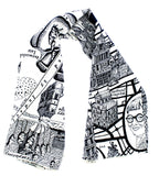  A loose scarf displaying a black and white map of a walled city and a self-portrait of Grayson Perry in the corner.